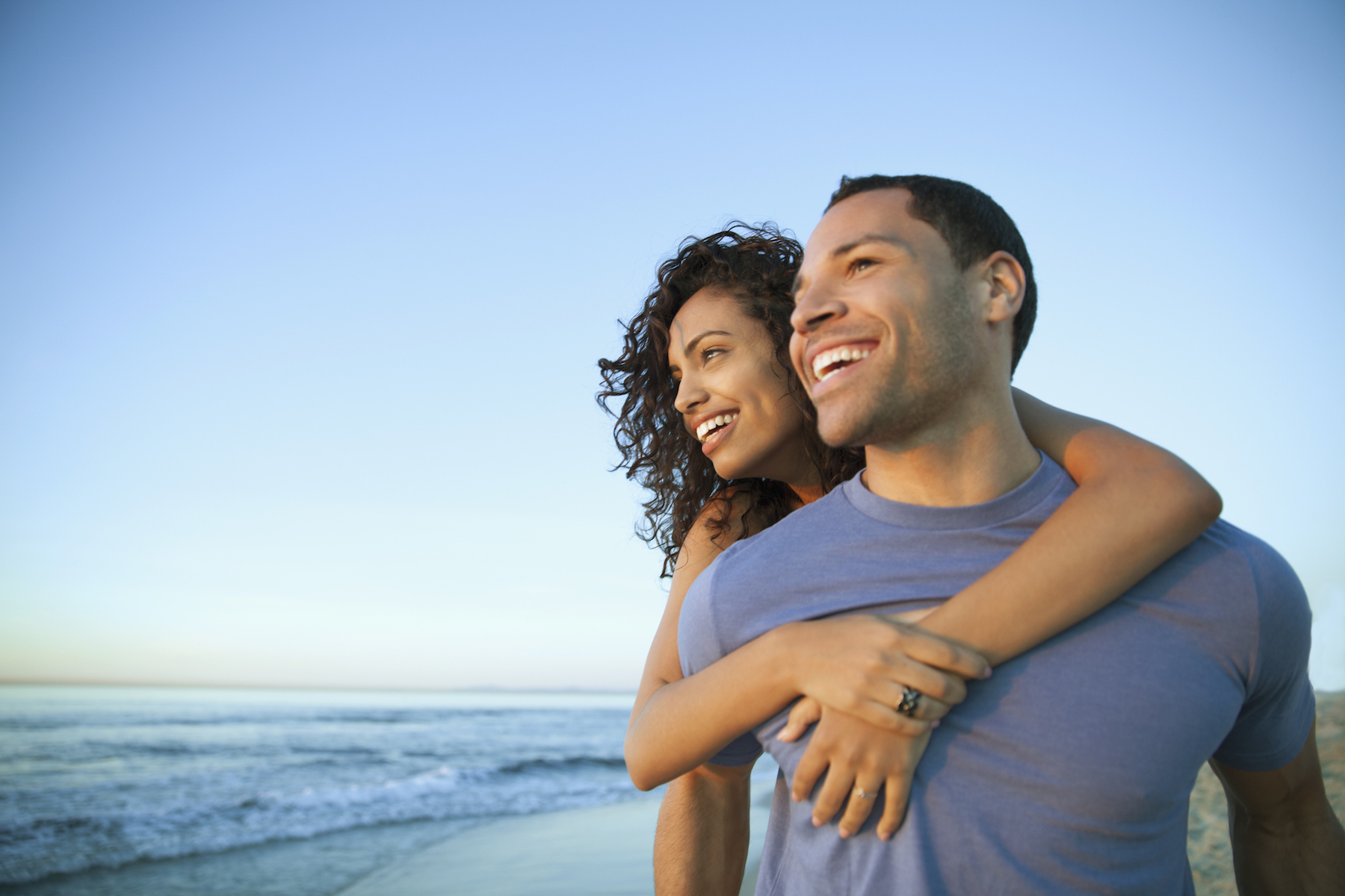 Couple smiling on beach